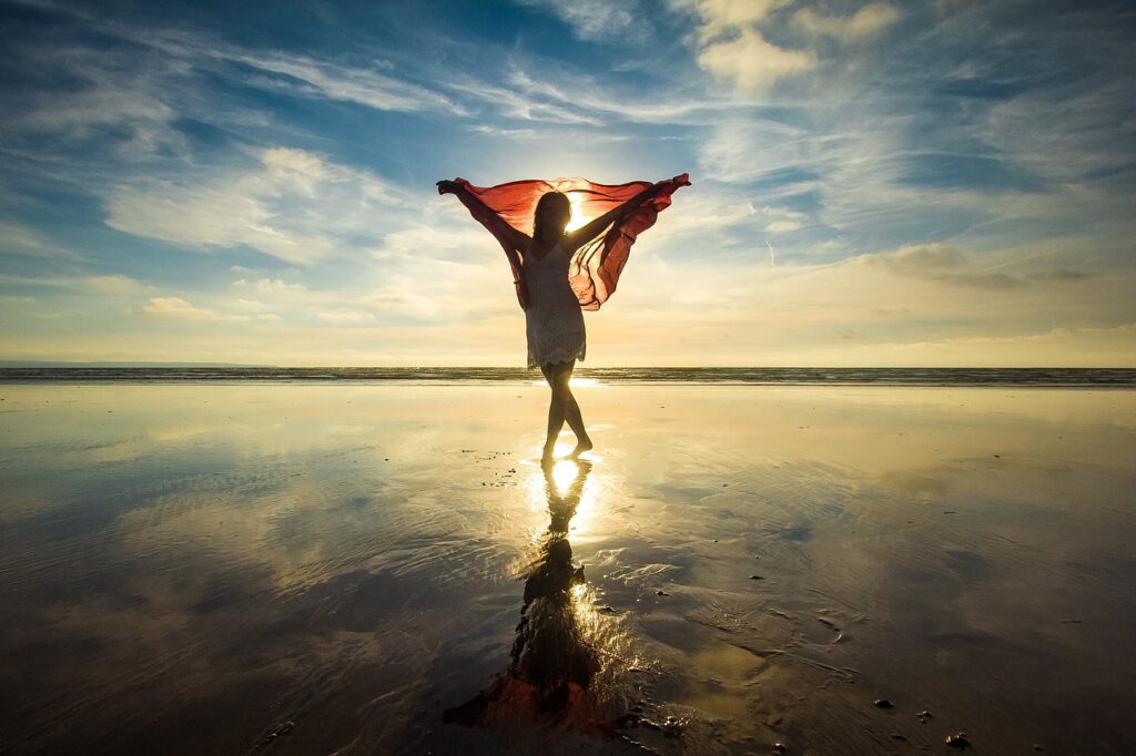 silhouette, a woman, sunset